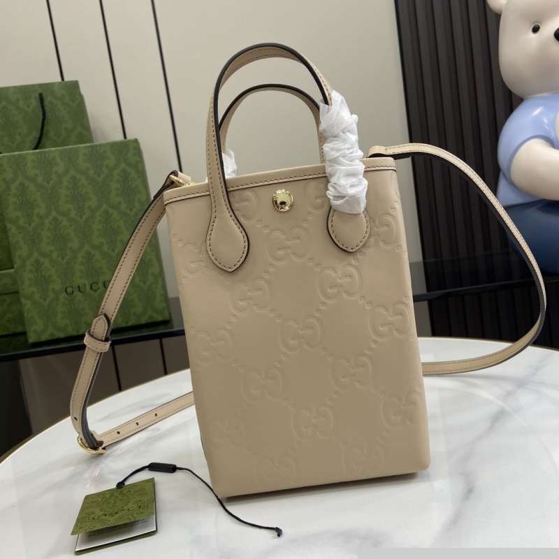 G*u*i top handle bags